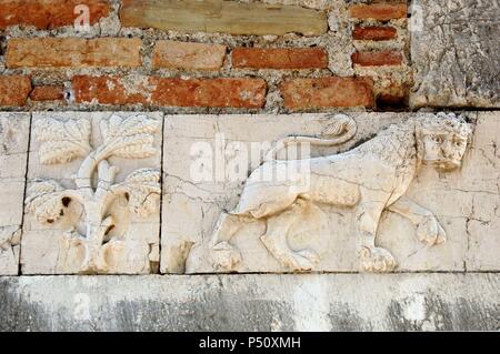 BYZANTINE ART. REPUBLIC OF ALBANIA. St. Nicholas Church, built in the XIII and remodeled in the eighteenth and nineteenth centuries. Relief with a lion and tree. Mesopotam. Stock Photo