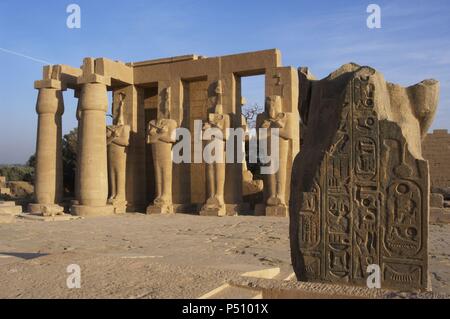 Rameseum. Pillars with osirian statues. 13th century B.C. Nineteenth Dynasty. New Kingdom. Necropolis of Thebes. Valley of the Kings. Egypt. Stock Photo