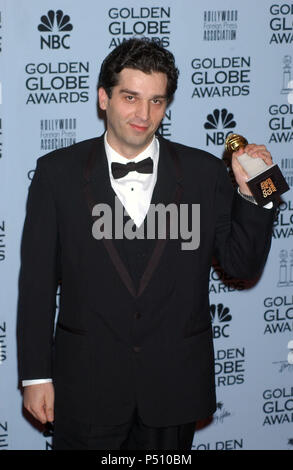 Davis Tanovic with award for best Foreign Language Film for 'No Man's Land,' at the 59th Annual Golden Globe Awards at the Beverly Hilton Hotel in Beverly Hills, Calif., Sunday, January 20, 2002.           -            TanovicDavis01.jpgTanovicDavis01  Event in Hollywood Life - California, Red Carpet Event, USA, Film Industry, Celebrities, Photography, Bestof, Arts Culture and Entertainment, Topix Celebrities fashion, Best of, Hollywood Life, Event in Hollywood Life - California,  backstage trophy, Awards show, movie celebrities, TV celebrities, Music celebrities, Topix, Bestof, Arts Culture a Stock Photo