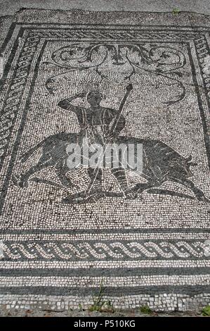 Ostia Antica. Square of the Guilds or Corporations. Mosaic depicting a hunting scene. Near Rome. Stock Photo