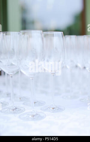 Many empty wineglasses on table. Stock Photo