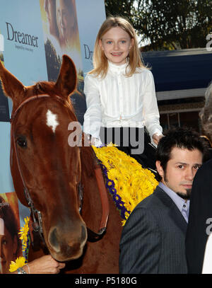 Dakota Fanning arriving at the DREAMER Premiere at the Westwood Man Theatre in Los Angeles. October 9, 2005.FanningDakota062 Red Carpet Event, Vertical, USA, Film Industry, Celebrities,  Photography, Bestof, Arts Culture and Entertainment, Topix Celebrities fashion /  Vertical, Best of, Event in Hollywood Life - California,  Red Carpet and backstage, USA, Film Industry, Celebrities,  movie celebrities, TV celebrities, Music celebrities, Photography, Bestof, Arts Culture and Entertainment,  Topix, vertical, one person,, from the years , 2003 to 2005, inquiry tsuni@Gamma-USA.com - Three Quarters Stock Photo