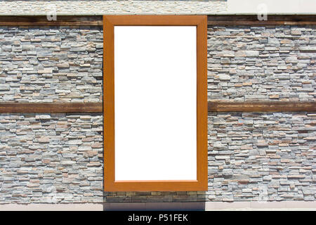 Vertical wooden poster on stone textured wall. Blank template Stock Photo