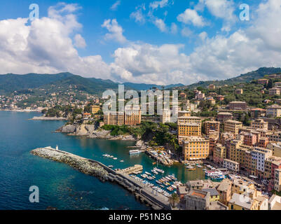 Aerial View of Camogli town in Liguria, Italy. Scenic Mediterranean riviera coast. Historical Old Town Camogli with colorful houses and sand beach at Stock Photo