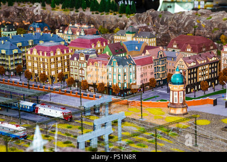 a toy city with a railway and trains a colorful background image Stock Photo