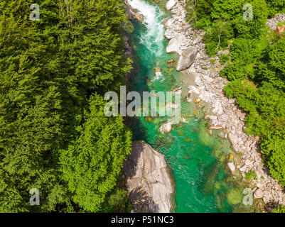 Valle Verzasca - Aerial View of clear and turquoise water stream and rocks in Verzasca River in Ticino - Verzasca Valley in Tessin, Switzerland Stock Photo