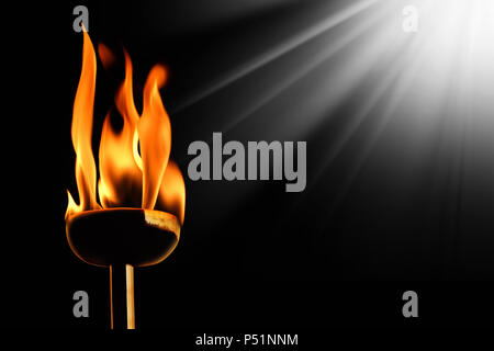 close up shot of burning flaming torch. Stock Photo