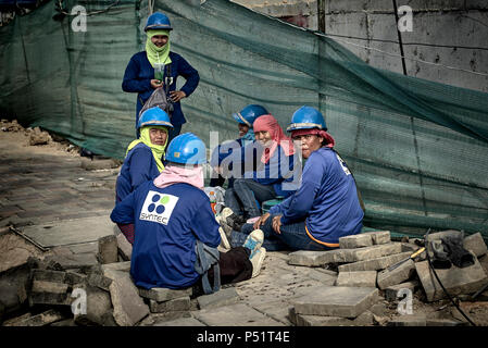 Woman builder. Thailand female construction workers. Thai builders, Asian building site Stock Photo