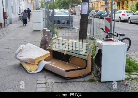 Illegally parked bulky waste in the streets of Berlin Stock Photo