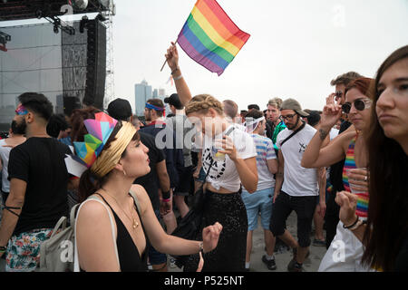 New York, USA. 23rd June, 2018. Concluding Gay Pride Week in New York City, Pride Island on Pier 97 in midtown Manhattan is showcasing a variety of musical talent plus opportunities over a two-day period for the LGBTQ community to dance, drink, eat and socialize. Some of the proceeds will go to support non-profit organizations in the New York City area. (Credit: Terese Loeb Kreuzer/Alamy Live News) Stock Photo