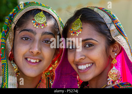 Glasgow, UK. 24th June, 2018. On a sunny summers day, thousands turned out to the annual Glasgow Mela held in Kelvingrove Park to enjoy a day of celebration of all aspects of Asian culture. There were many Asian bands and dance troops including the RAJASTAN HERITAGE BRASS BAND on their second appearance at the Mela and the GABHRU PANJAB DE Asian dance troop from Birmingham on their first appearance Credit: Findlay/Alamy Live News Stock Photo