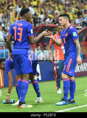 Kazan, Russia. 24th June, 2018. Colombia's Yerry Mina (L) and James Rodriguez celebrate scoring during the 2018 FIFA World Cup Group H match between Poland and Colombia in Kazan, Russia, June 24, 2018. Credit: He Canling/Xinhua/Alamy Live News Stock Photo