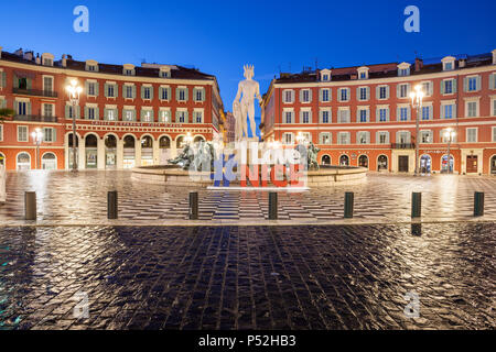 France, Nice city at dawn, Fountain of the Sun (Fontaine du Soleil) with Apollo statue at Place Massena, main square in the city center Stock Photo