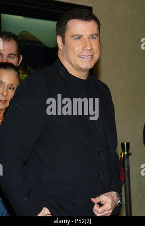 John Travolta arriving at A Love Song For Bobby Long Premiere at the Bruin Theatre in Los Angeles. December 13, 2004.TravoltaJohn034 Red Carpet Event, Vertical, USA, Film Industry, Celebrities,  Photography, Bestof, Arts Culture and Entertainment, Topix Celebrities fashion /  Vertical, Best of, Event in Hollywood Life - California,  Red Carpet and backstage, USA, Film Industry, Celebrities,  movie celebrities, TV celebrities, Music celebrities, Photography, Bestof, Arts Culture and Entertainment,  Topix, vertical, one person,, from the years , 2003 to 2005, inquiry tsuni@Gamma-USA.com - Three  Stock Photo