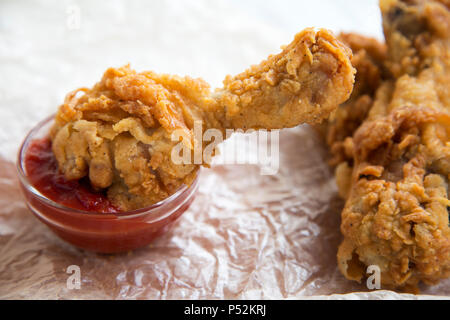 Fried chicken legs, side view. Close-up. Stock Photo