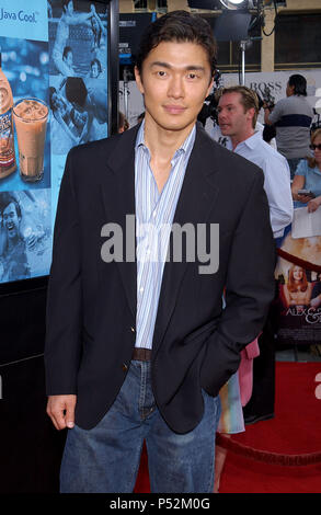 Rick Yume arriving at the Premiere of ' Alex & Emma ' at the Chinese Theatre in Los Angeles. June 16, 2003. YuneRick024 Red Carpet Event, Vertical, USA, Film Industry, Celebrities,  Photography, Bestof, Arts Culture and Entertainment, Topix Celebrities fashion /  Vertical, Best of, Event in Hollywood Life - California,  Red Carpet and backstage, USA, Film Industry, Celebrities,  movie celebrities, TV celebrities, Music celebrities, Photography, Bestof, Arts Culture and Entertainment,  Topix, vertical, one person,, from the years , 2003 to 2005, inquiry tsuni@Gamma-USA.com - Three Quarters Stock Photo