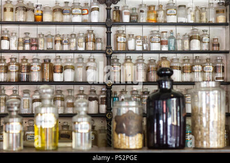 Old fashioned Pharmaceutical display in a Victorian Apothecary Stock Photo