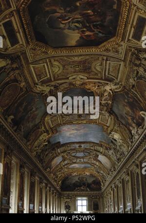 France. Paris. Louvre. Apollo Gallery.  Decorated ceiling. Stock Photo