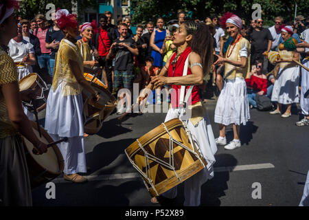 The street parade is the highlight of Carnival of Cultures during Pentecost weekend in Berlin. Stock Photo