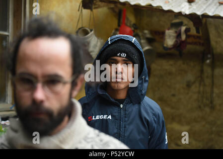 February 7, 2017 - Breil-sur-Roya, France: Portrait of Mohamed Sadeq, a young Sudanese migrant hosted by Cedric Herrou in Breil-sur-Roya. The Roya Valley is a small enclave of French territory north of the Italian town of Vintimiglia where dozens of French citizens have been hosting and helping migrants. It has gained the reputation of a rebellious and humanitarian zone, whose inhabitants are staunchly opposed to the French government's crackdown on illegal migration. Stock Photo