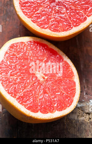 Red grapefruit cut in half Stock Photo
