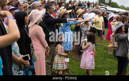 The Plains, Virginia/USA-5-19-17: Group of people point at The Virginia Gold Cup. Stock Photo