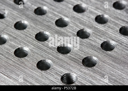 Silver metal background with round hole Stock Photo