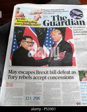 USA President Donald Trump meeting with North Korea President Kim Jong-Un in Singapore on Guardian newspaper front page news London  13 June 2018 Stock Photo