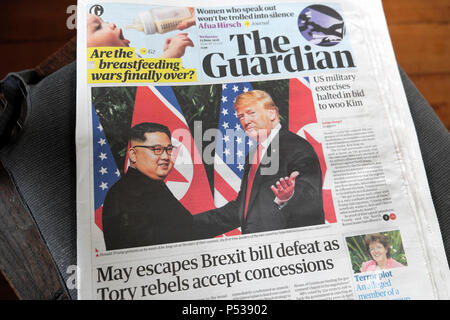 USA President Donald Trump meeting with North Korea President Kim Jong-Un in Singapore on Guardian newspaper front page news London  13 June 2018 Stock Photo