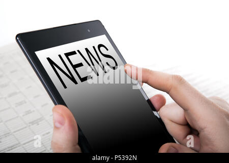 human hand pushing on a touch screen Stock Photo