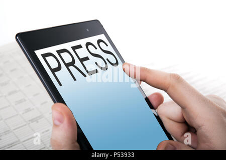 human hand pushing on a touch screen Stock Photo