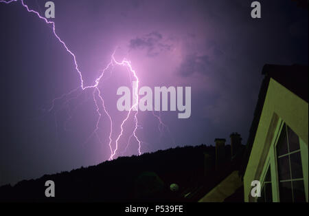 A bolt of lightning over the City of Budapest, Hungary, during a severe summer thunderstorm Stock Photo