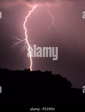 A cloud to ground lightning strike during a severe thunderstorm near Minneapolis, Minnesota, USA Stock Photo