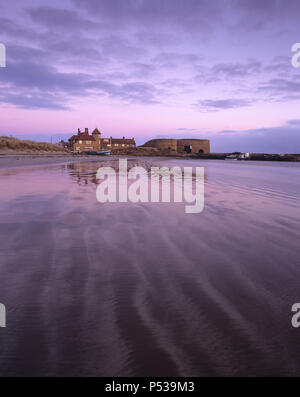 The sand beach of Beadnell Bay on the coast of Northumberland, England Stock Photo