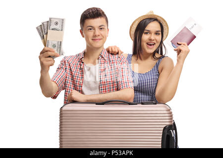 Teenage tourists with bundles of money and a passport isolated on white background Stock Photo