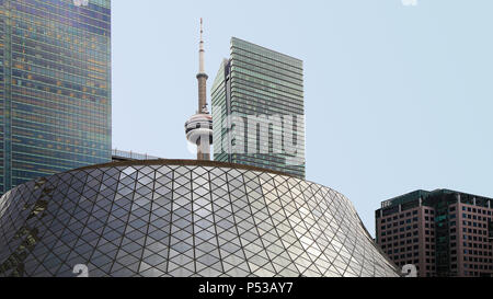 The Roy Thompson Hall in Toronto with the CN Tower behind Stock Photo