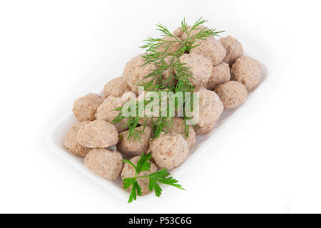 Freshly frozen semi-finished products. Meatballs of tender meat.  Isolate on white background. Stock Photo