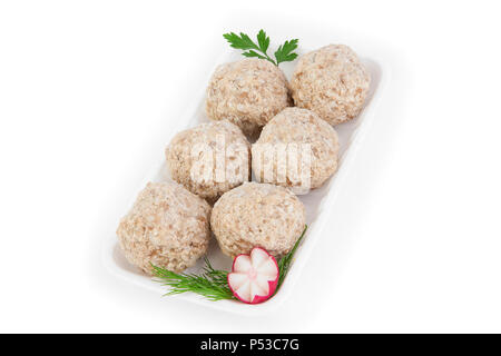Freshly frozen semi-finished products. Cutlets from tender meat of chicken in a cover made of biscuits.  Isolate on white background. Stock Photo