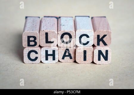 block chain concept - letters on wooden blocks - Stock Photo