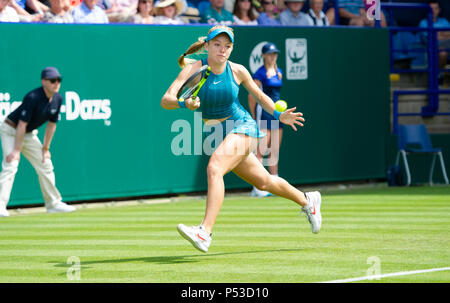 Katie Swan of Great Britain plays a shot in her first round match against Danielle Collins of USA during the Nature Valley International tennis tournament at Devonshire Park in Eastbourne East Sussex UK. 24 June 2018
