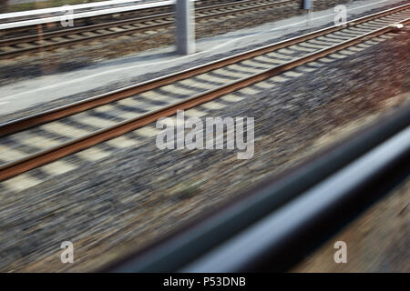 Berlin, Germany - View of railway tracks from a moving train in Berlin-Adlershof. Stock Photo