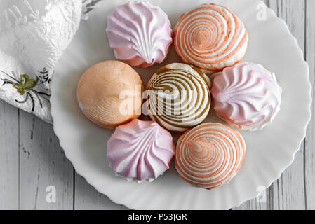 Marshmallows of different varieties on a plate. Stock Photo