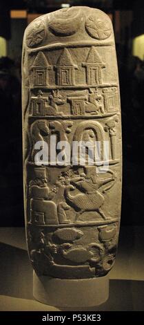 Babylonian. Second Dynasty of Isin in the reign of Nebuchadnezzar II (1126-1105 BC).   Boundary-stone. Kudurru. Limestone stela. Relief with symbols. Sippar, Abu Habba. Iraq. British Museum. Stock Photo