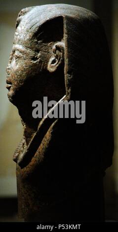 Head of Pharaoh, probably Ramesses II. Red granite. 19th Dynasty. New Kingdom. 1250 B.C. British Museum. London. England. United Kingdom. Stock Photo