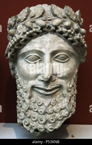 Head from a statue of a bearded man with laurel wreath. Probably an priest. Limestone. Sculpted in Cyprus between 475-450 BC. From the Sanctuary of Apollo at Idalion. British Museum. London. England. United Kingdom. Stock Photo