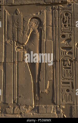 Egyptian Art. The Karnak Temple Complex. Relief depicting the god Ptah. 19th Dynasty. New Kingdom. Egypt. Stock Photo