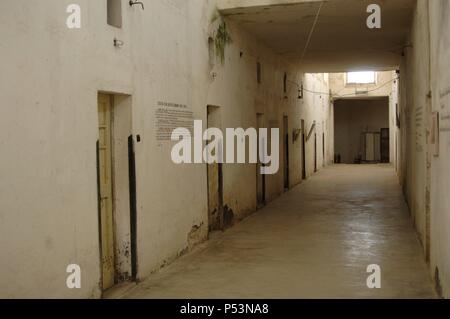 Albania. Gjirokaster. Prison cells in the northern of the Castle. It was converted in prison by King Zog I (1895-1961) and also it was used by the Nazis for political prisoners during the communist regime. Stock Photo