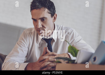 Nice young man feeling upset Stock Photo