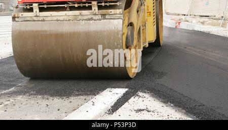 Road roller on asphalt pavement works. Barcelona. Spain. Stock Photo