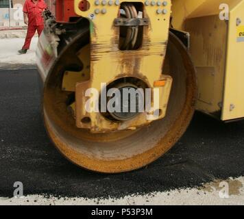 Road roller on asphalt pavement works. Barcelona. Spain. Stock Photo